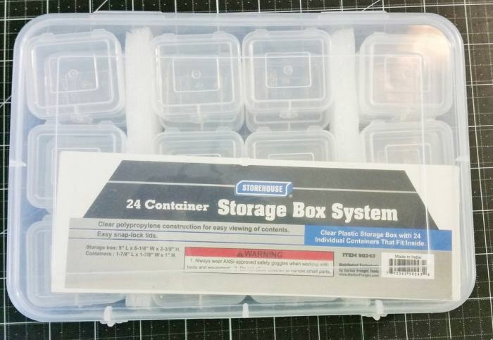 Storage containers with multiple sections are an efficient way to store embellishments. You can do them by color or product type. They can be stacked on a shelf or stored in a draw