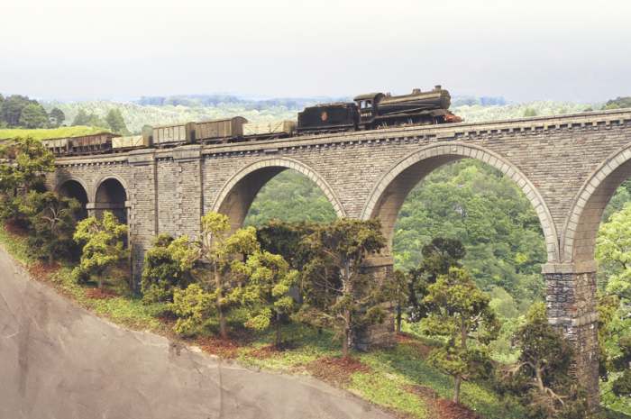 A 'pick-up', branch goods train hauled by LNER Gresley Class J39 returns to Haltwhisle from Alston along branch lines long since ripped up, including this one.