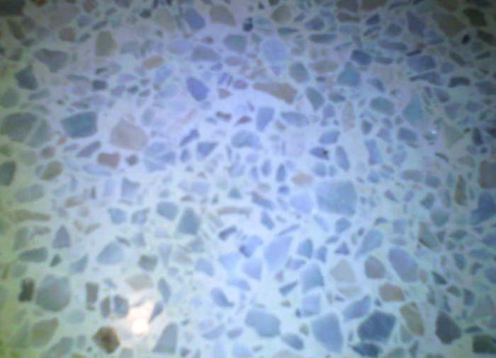 My terrazzo has flecks of light slate blue and bits of carmel against a very white background.