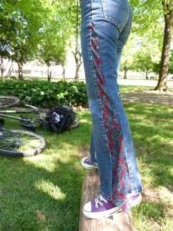 I desperately wish this were a tutorial because I have a denim skirt just waiting to be tranformed. I think I can figure it out with a little inspiration here from Deviant Art. Love these jeans with the little necktie peak at the bottom!