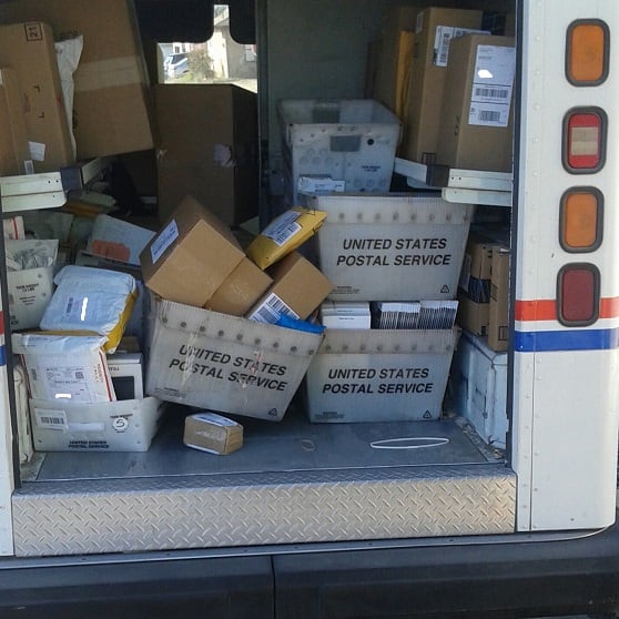 Santa loads his LLV for business. Reindeer not pictured. This was a light day for Xmas 2016, it got worse!