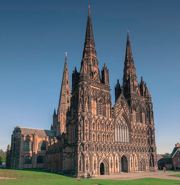 A picture of the west face of Lichfield Cathedral showcasing its three iconic spires. Source: Bs0u10e01 via Wikimedia Commons