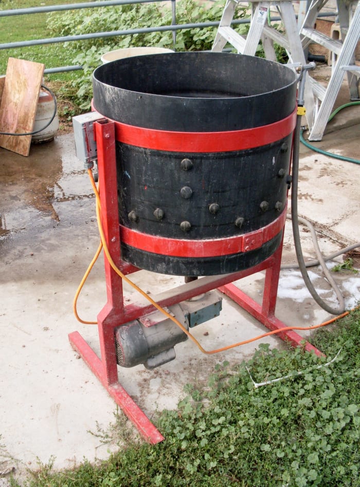 A chicken plucker. This one is based on the Tub Style Mechanical Chicken Plucker design, sold below.