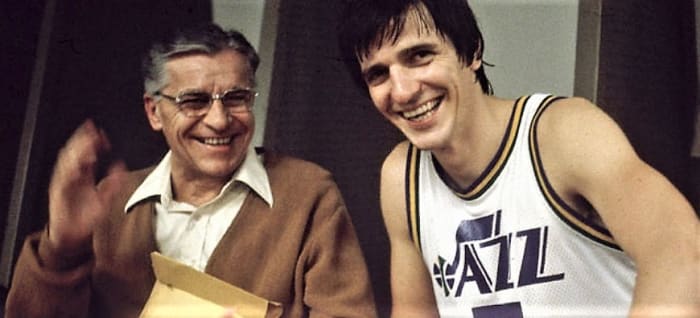Finally able to just enjoy each other's company, Dad and son share a post game laugh in the New Orleans locker room.