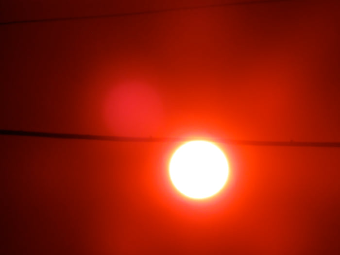 Got lucky again with this picture clearly portraying what the Sheeple refer to as a Sun Dog. One man's lens flare is another man's Sun Dog!