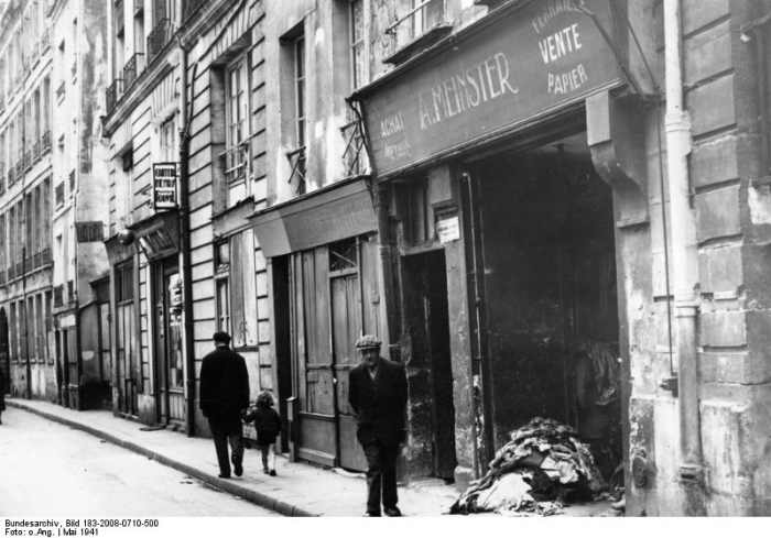 Paris, May 1941 . Little by little, Jewish shops and clothing manufacturing businesses in the Saint Paul district will disappear, following the arrest and deportation of many Jewish people of Paris