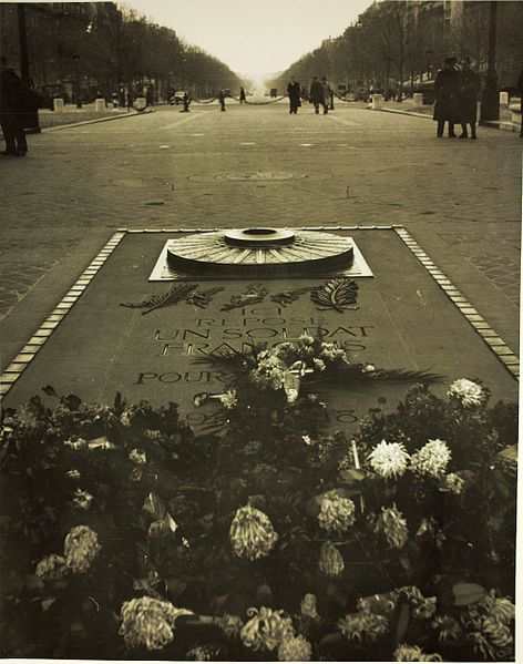 Unknown soldier tomb, located right under the Arc de Triomphe monument. This particular picture shows a perspective of the Avenue des Champs Elysees, all the way down to Place de la Concorde. C.1941