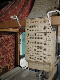 Close-up view of the punch cards used by Jacquard loom on display at the Museum of Science and Industry in Manchester, England. Credit: George H. Williams, 2004.