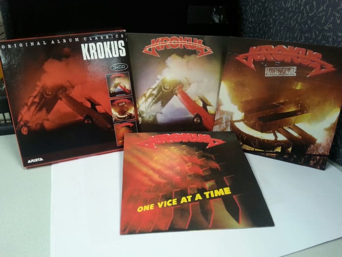 This box set includes CDs of the "Metal Rendez-vous" (1980), "Hardware" (1981) and "One Vice at a Time" (1982) albums, packaged in cool cardboard LP-replica sleeves.