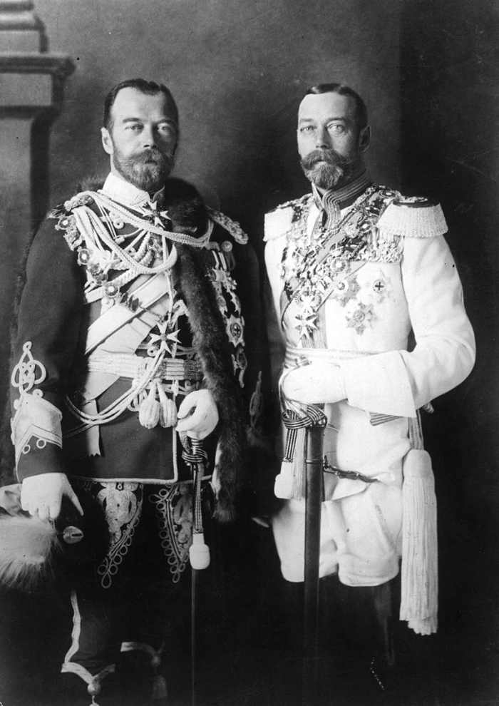Tsar Nicholas II of Russia with his physically similar cousin, King George V of the United Kingdom (right), wearing German military uniforms in Berlin before the First World War in 1913.