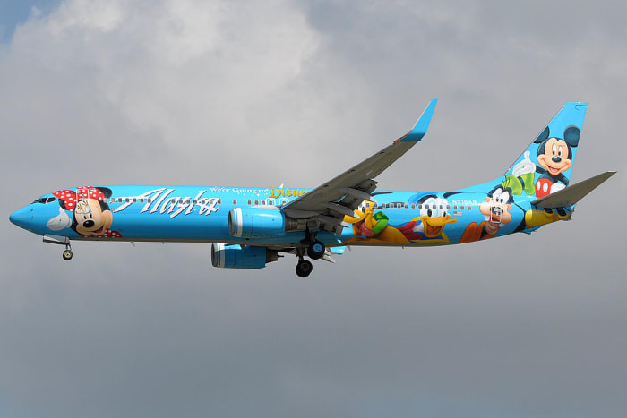 New Boeing 737-900 in 2011. America, the home of Mickey Mouse, sends a large order of new narrow-body 737s to China. Advertising brings in additional revenue.