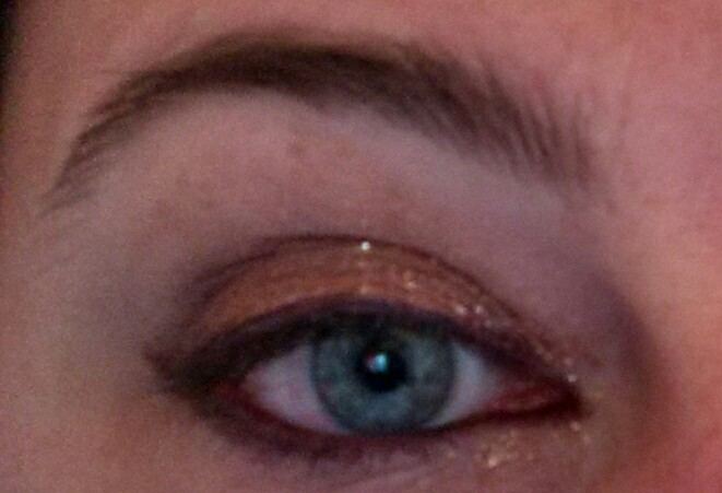 Burnished Bling shadow over eyelid with its glitter used as a highlight over eyelid and in the corner of the eye