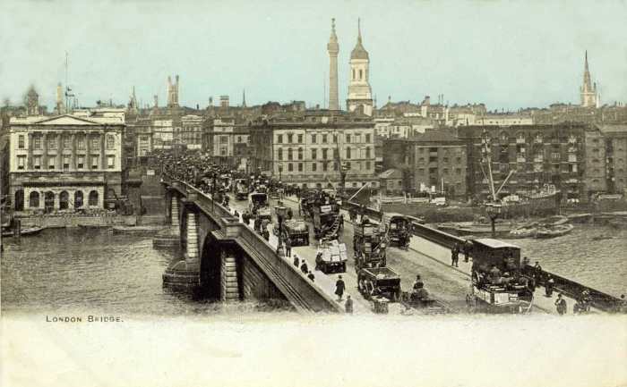 The bridge built in 1831 (William IV) and relocated in 1973 to Lake Havasu, Az (someone thought they'd bought Tower bridge?). Seen here looking from SE1 towards the City early 20th Century
