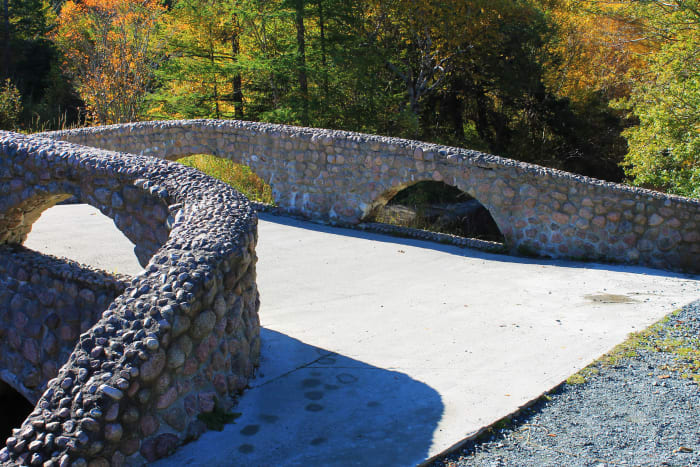 The historic Cobble Stone bridge that crosses South Brook River. Nicknamed Lovers Bridge, legend says that kissing one's significant other on this bridge means that you will marry. This area was also the site of the original Bowring Park swimming poo