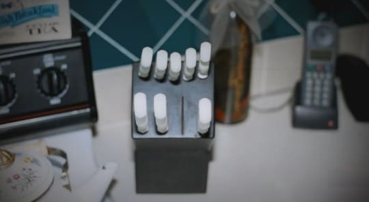The knife block on the counter in the Routier kitchen. After cutting the screen in the garage window, Darlie put the knife back in the block. Smudged fingerprints were found on this knife.