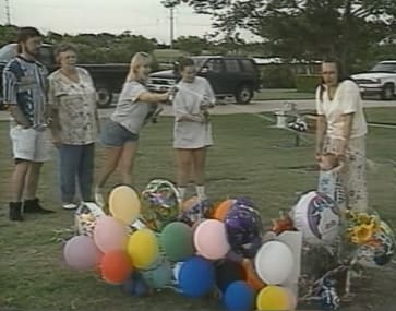 Although a private memorial service had taken place minutes earlier, images of Darlie smiling and laughing and spraying silly string on Devon's grave on his 7th birthday didn't sit well with observers. This was only 8 days after his brutal murder.