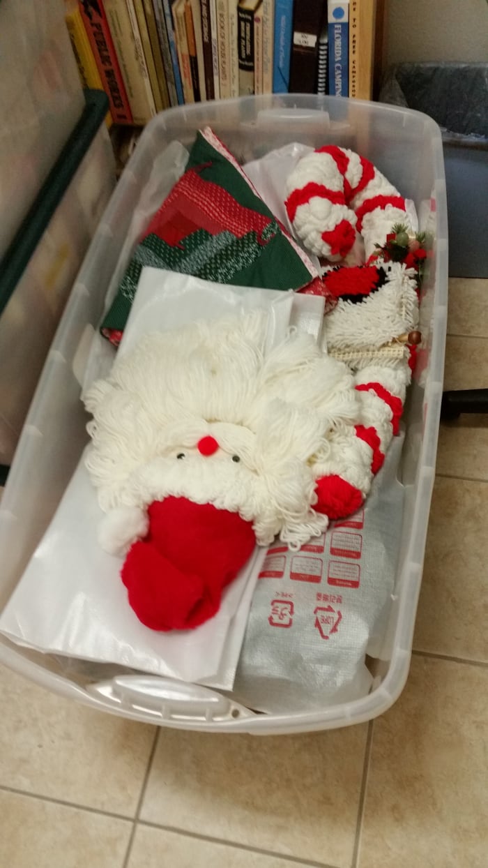 I use big storage tubs for my Christmas decorations. Put the heavier things on the bottom and soft, crushable items on top.