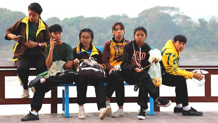 A lot of school parties from around N.E Thailand visit Chiang Khan. Locals also hang out on the promenade with Laos, and the River Mekong, as a backdrop