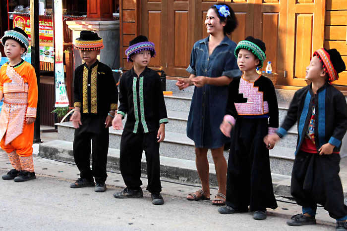 A children's dance troupe from the Khaokho District of Petchabun Province perform in costume for the tourists