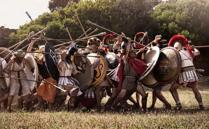Modern day reenactors attempt to perform an othismos, however notice the lack of maneuverability among those in the first rank, as well as the fact that both ranks more or less dissolved and are more of a mosh pit.