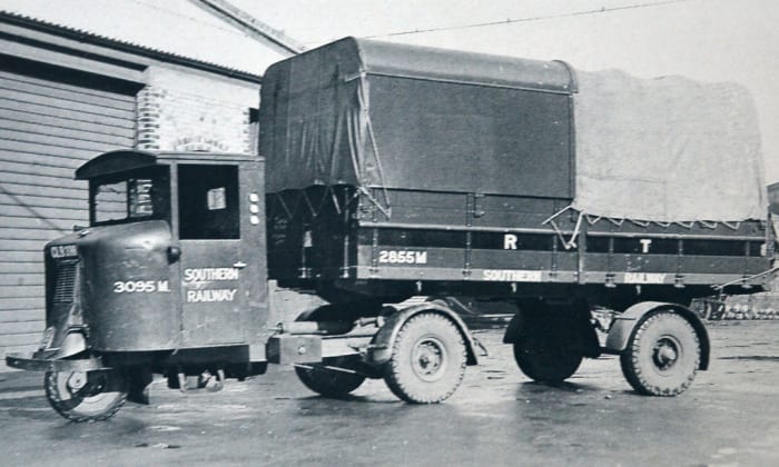A 1936 Southern Railway-owned Scammell 'Scarab' mechanical horse, a three-wheeled tractor unit for tight curves with fittings to take a divers range of two-wheeled trailers and release them for unloading at clients' premises