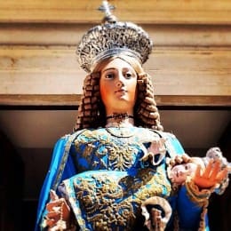 This is the statue of the Madonna of Genzano di Lucania, which is taken around the town in a procession. The feast lasts three days, all the town takes part at this religious feast in a way or another. So, the people have a good time.