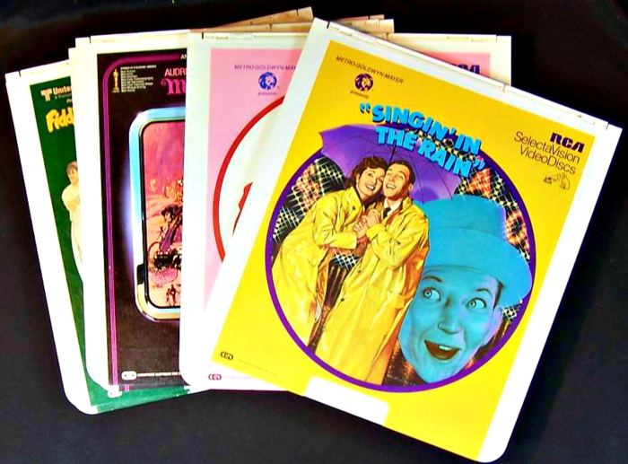 RCA SelectaVision CED video discs, four Musicals, FIddler, My Fair Lady, GiGi, and Singing in the Rain.