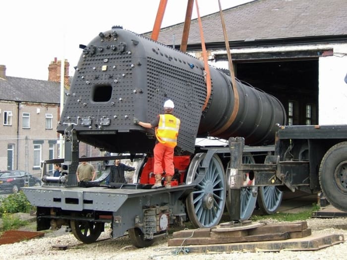 With £500K of sensitive equipment in its harness, the crane lowers the boiler onto its frames