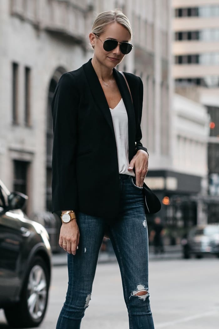 A blazer, plunging neckline and a tucked-in top all give you that much-desired length in your frame...