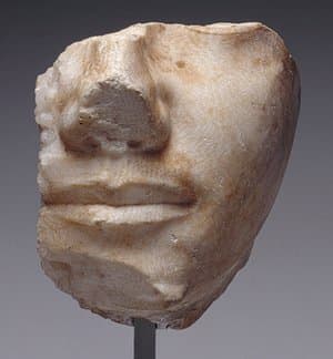 Fragmentary face of King Khafre. It displays - even at a small scale - the subtle and very sensitive modeling and finely finished surfaces of these masterpieces of Old King royal sculpture