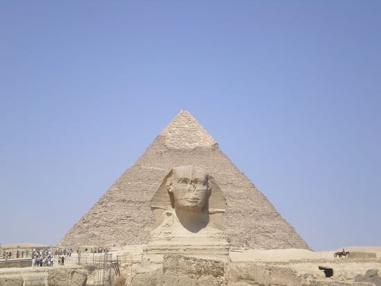 The Sphinx and the Great Pyramid in the Background. The Sphinx guards the Number One Ancient Wonder of the World.