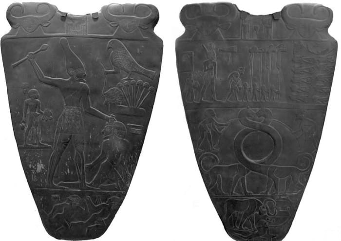Left Palette-The Principal scene on the Narmer Palette; Right Palette-King walks among decapitated bodies of is enemies; the middle part is the intrusion of Mesopotamian part-which I do not buy-lower part of this panel shows King as royal strong bull