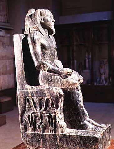 Seated, Statue of Khafre(Cephren), at Giza, Old Kingdom - Dynasty IV. He was the son of Khufu, builder of the Great Pyramid.
