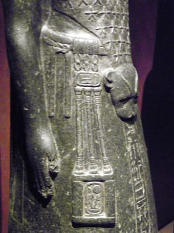 The priest Anen with a leopard skin imitation and a decorative sash. He served under Pharaoh Amenhotep III., 14th cent. B.C. (Statue was found in Karnak, today: Turin, Egyptian Museum)