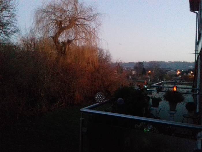 Photo taken from next door. Night light sensor. This is a smaller version, as I am still waiting for the large one