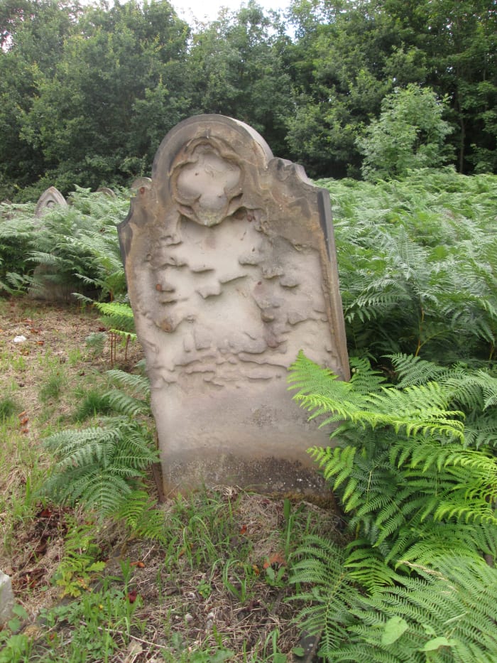 ... Often soft sandstone has been used - a token gesture toward the departed - but names and dates are lost to the extremes of summer and winter...