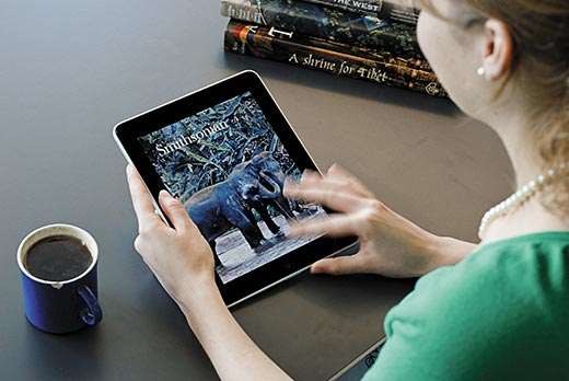 Kevin Kelly worries devices like Apple's iPad, shown here with Smithsonian's first cover, nurtures action over contemplation.