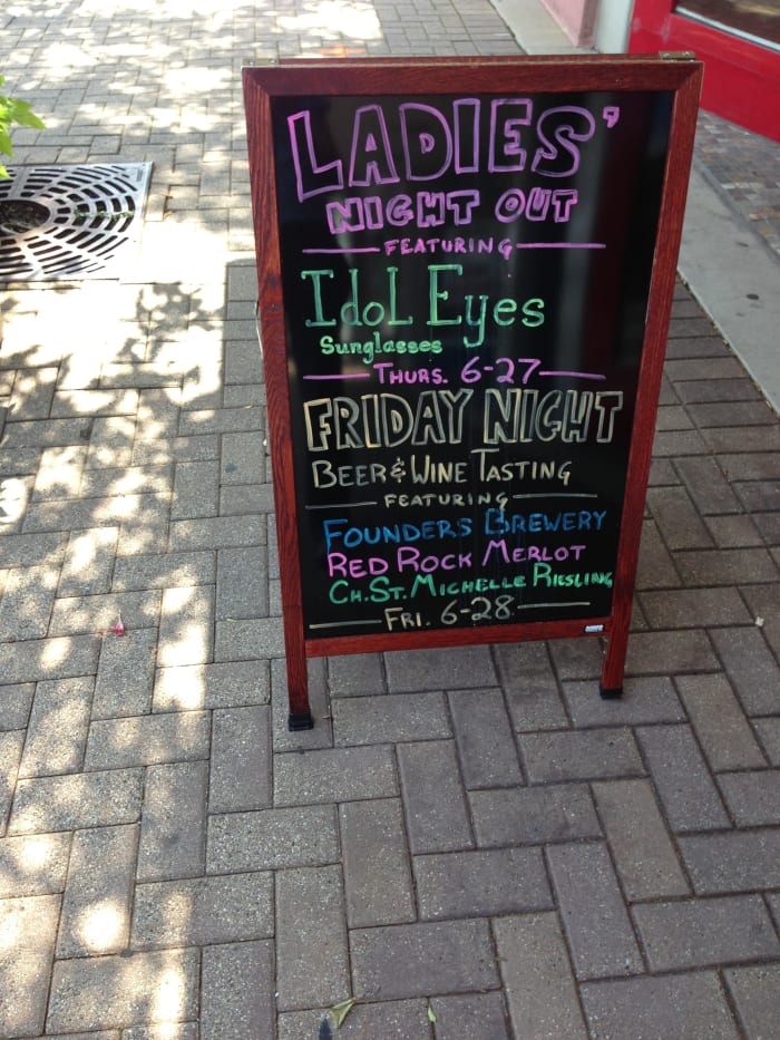 Sidewalk chalkboard (or whiteboard or blackboard) tent signs provide flexibility and visibility at low cost, particularly for small businesses in retail areas.