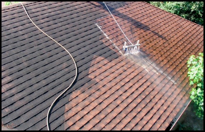 Pressure washing can easily damage roof shingles if you are not careful, so test the setting you use on loose shingles first.