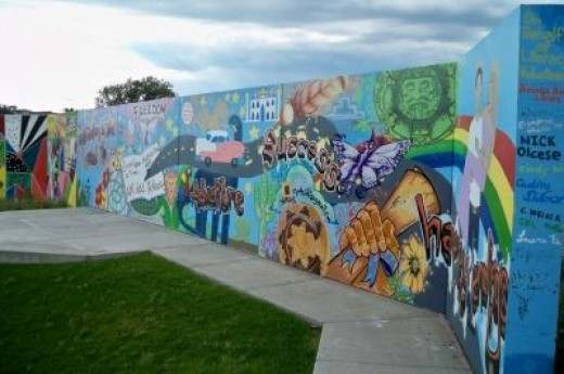 A mural on behalf of Literacy Volunteers -- "Reading is the road to freedom, adventure, success, happy endings."