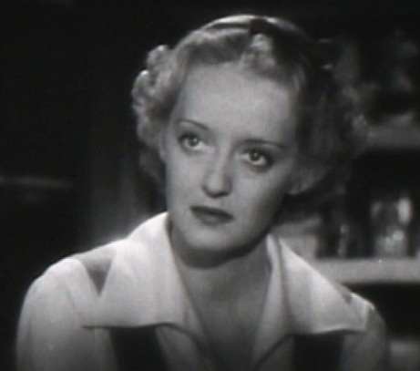 Bette Davis wears a cropped style to stop the eye before it goes down the length of the face in one fell swoop.
