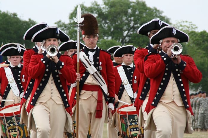 The Old Guard Fife and Drum Corps belkings to the 3rd US Infantry Regiment (The Old Guard) at Fort Myer, Va and commemorates General Geroge Washington's Continental Army, which wore red coats.