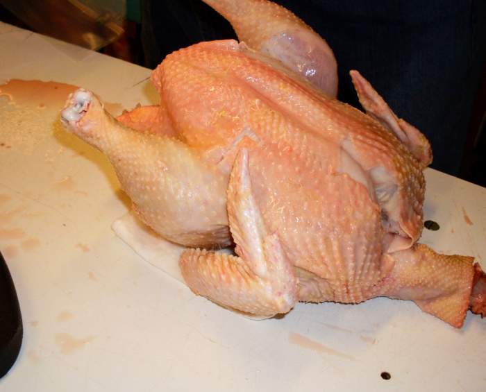 If you plan to thaw the chickens in the refrigerator, place them on a folded paper towel pad (folded in quarters), to soak up fluids.