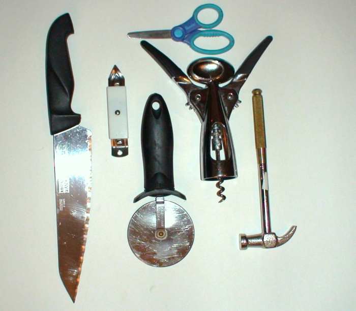 Scissors, bottle openers, and hammers are levers. Pizza cutters and knives are wedges. The Corkscrew is a screw. All are everyday examples of simple machines.