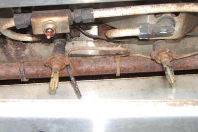 20 year old DCS control valves from a gas grill recently repaired. while this doesn't look beautiful most barbecues purchased 20 years ago would be dead several times over. this grill is still in use and with $1000. of parts and service will last a