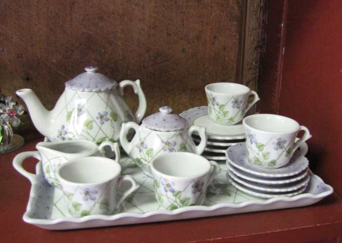 Just imagine the delight of a little girl receiving this miniature tea set to use with her doll.
