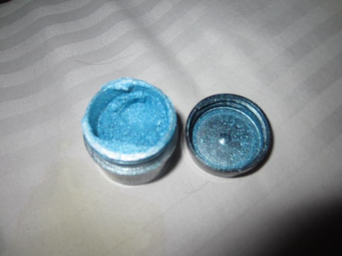 Mica powder is another great, non-toxic colorant. They come in almost every imaginable color.