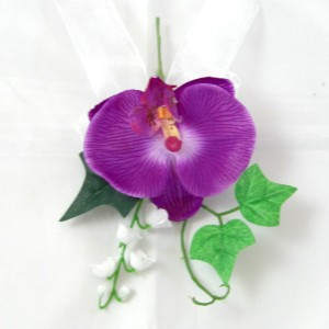 This will be the grooms boutonniere. The rest of the bouquet will be used on the cake,wedding book,archway,the brides hair-piece and anywhere else we need a touch of color.