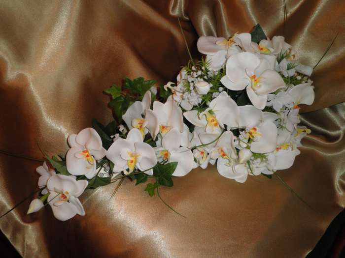 This is the actual orchid flower bouquet that Rose purchased for her wedding. It was quite lovely and also very realistic.