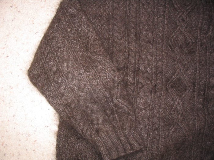 A cable knit sweater is one of the finer things in life! It seems even warmer and more comfortable than a traditional knitted sweater.